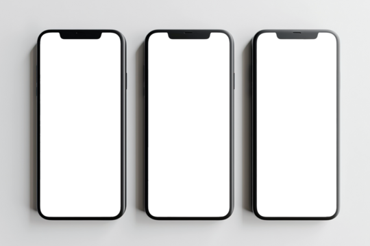 Flat lay of three smartphones with white blank screens mockup on white background. Top view of three smartphones business infographic mockups of web site or design app.