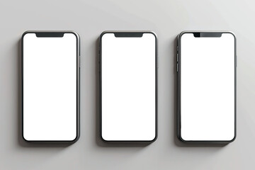 Flat lay of three smartphones with white blank screens mockup on light grey background. Top view of three smartphones business infographic mockups of web site or design app.