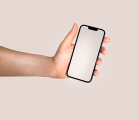 Hand holding smartphone. Blank screen mockup.