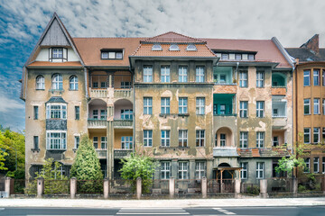 Old neglected tenement houses. Urban architecture.