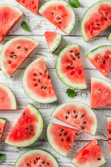 Top down view slices of watermelon on white the table summer concept
