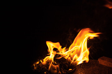 Fire texture on a black background. The fire pattern at night has its own impression.