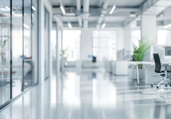 Blurred office interior background with white walls and glass windows