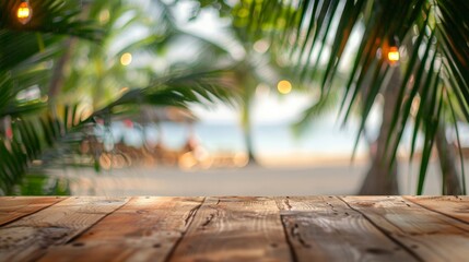 Empty wooden table top for product display, presentation stage. Tropical summer, palm trees, beach bar, white sand and blue ocean in the background. 