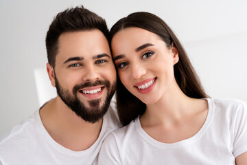 Portrait of happy smiling two people together in house indoors
