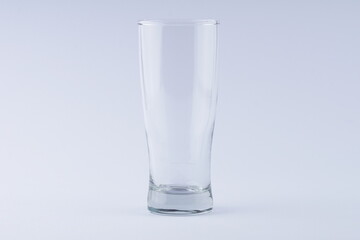 glass cup on white background with studio lighting
