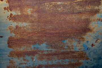 Rust on a metal blue panel for a grunge background and texture