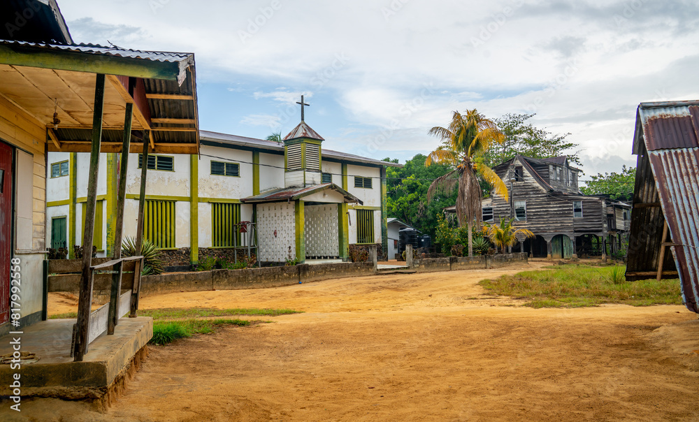 Wall mural Street scene in the inland village of Botopasi, Suriname
