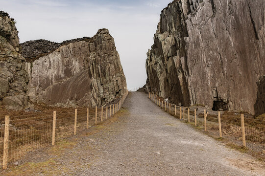 Dinorwic or Dinorwig Slate quarry galleries, Lake Llyn Peris and Snowdonia Mountains in background.