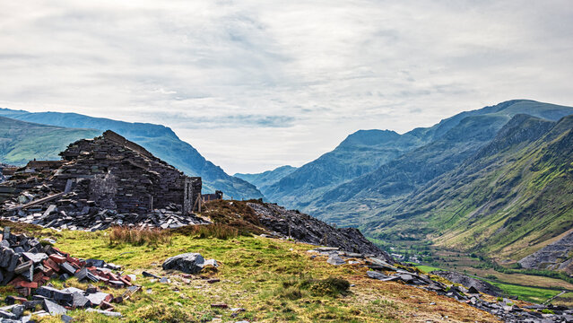 Dinorwic or Dinorwig Slate quarry galleries, Lake Llyn Peris and Snowdonia Mountains in background.