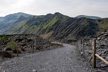 Dinorwic or Dinorwig Slate quarry galleries, Lake Llyn Peris and Snowdonia Mountains in background.