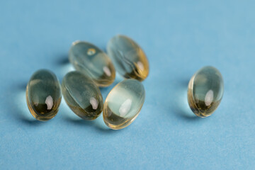 transparent medicines on a blue background