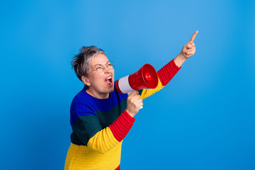 Photo of mad furious crazy senior woman wear stylish clothes hold megaphone look empty space...