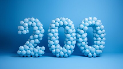 200 made of plastic balls on blue background. 3d made of blue plastic balls on a blue background.
