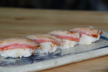 sushi on a plate Salmon steak: smoked salmon: salmon sushi