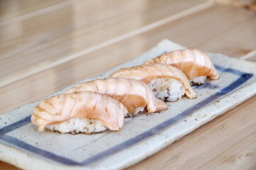 smoked salmon on a wooden board Salmon steak: smoked salmon: salmon sushi