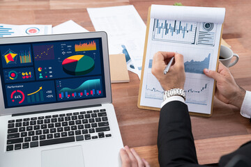 Financial data analysis dashboard by Fintech BI or business intelligence display on laptop screen...