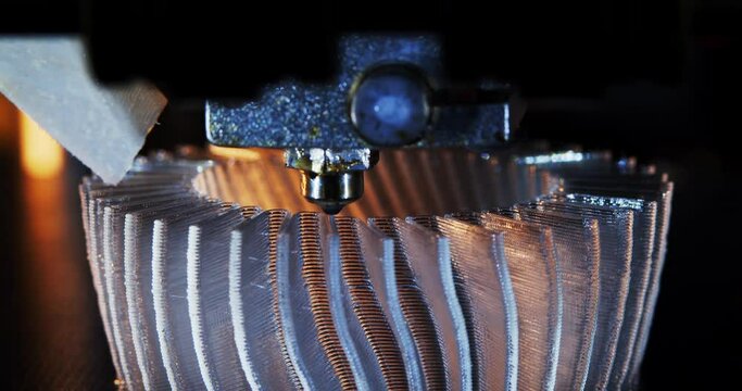 3D printer working. Fused deposition modeling, FDM. 3D printer printing an object from plastic. Automatic three dimensional 3d printer performs plastic. Progressive additive technology for 3d printing