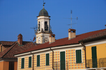 Fototapeta premium Gaggiano, Milan Italy: exterior of historic houses along the Naviglio Grande
