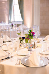 Elegant table setting for a wedding reception.