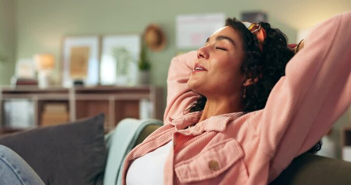 Woman, relax and stretching on home sofa for stress relief for comfortable resting, calm or apartment. Female person, couch and living room for day off break or long weekend peace, happy or morning