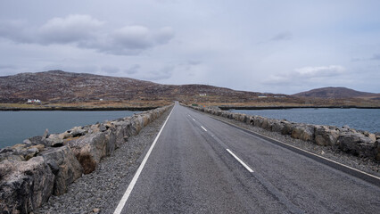 A view of the causeway connecting Eriskay to South Uist on the Outer Hebrides of Western Scotland UK