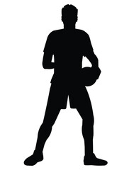 Obraz premium Silhouette of a volleyball player standing with the ball in his hands during a game