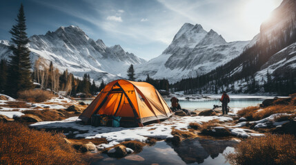 Group of Travelers Opening Tent with Scenic Mountain Lodge View during Winter Camping Trip