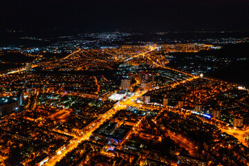 Aerial view of night streets and squares of Barcelona, Spain