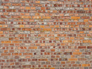 old fortress wall of stones. Background of medieval brickwork for design.