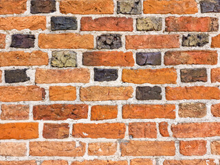 Fototapeta premium old fortress wall of stones. Background of medieval brickwork for design.