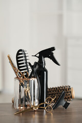 Set of hairdresser tools on table in salon