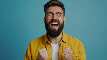 Fototapeta premium joyful bearded man celebrating amazing success excited laughter portrait