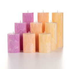 Collection of handcrafted pink and green palm wax candles of different sizes, ideal for adding...