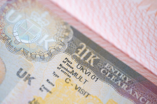 British tourist visa in passport, United Kingdom travel multivisa close-up, travel permit, pass border control, international voyage, UK entry