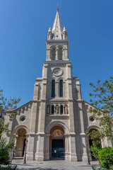 Obraz premium Paris, France - 04 17 2024: View the facade of Saint Michel Church of Paris from the street .