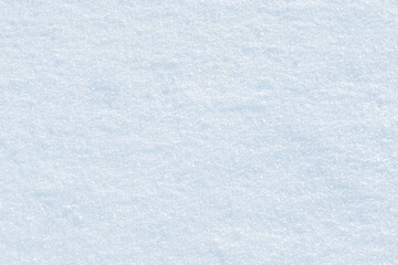 Fresh sparkling blue snow close-up, perfect as a winter season background or texture