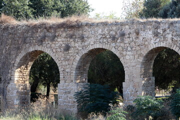 Fototapeta na wymiar An ancient aqueduct for supplying water to populated areas.