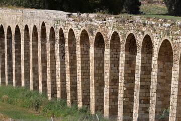 An ancient aqueduct for supplying water to populated areas.