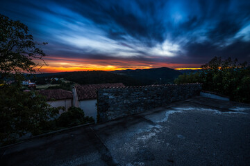 Romantic sunset in small village on the countryside in Slovenian wild nature. Such a calm and...