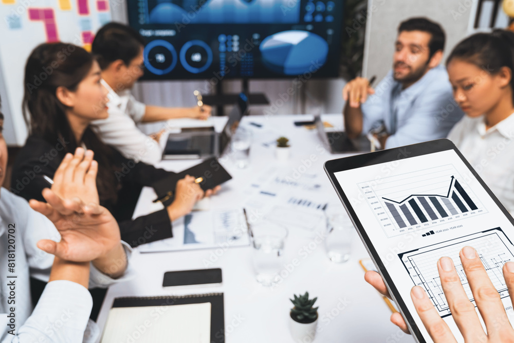 Fototapete analyst team uses bi fintech display tablet to analyze financial data . business people analyze bi s