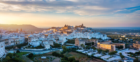 Naklejka premium View of Ostuni white town, Brindisi, Puglia (Apulia), Italy, Europe. Old Town is Ostuni's citadel. Ostuni is referred to as the White Town. Ostuni white town skyline and church, Brindisi, Italy.