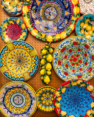Collection of colorful Italian ceramic pottery, local craft products from Positano, Italy. Ceramic...