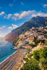 View of Positano with comfortable beach and blue sea on Amalfi Coast in Campania, Italy. Positano village on the Amalfi Coast, Salerno, Campania. Beautiful Positano, Amalfi Coast in Campania.