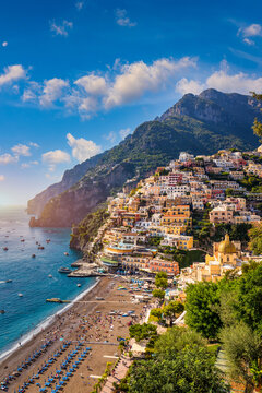 View of Positano with comfortable beach and blue sea on Amalfi Coast in Campania, Italy. Positano village on the Amalfi Coast, Salerno, Campania. Beautiful Positano, Amalfi Coast in Campania.