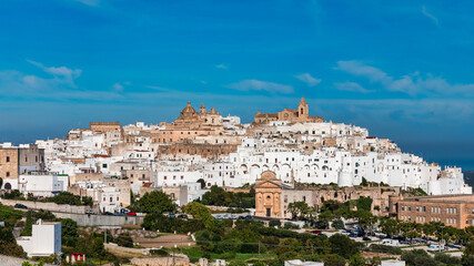 Obraz premium View of Ostuni white town, Brindisi, Puglia (Apulia), Italy, Europe. Old Town is Ostuni's citadel. Ostuni is referred to as the White Town. Ostuni white town skyline and church, Brindisi, Italy.