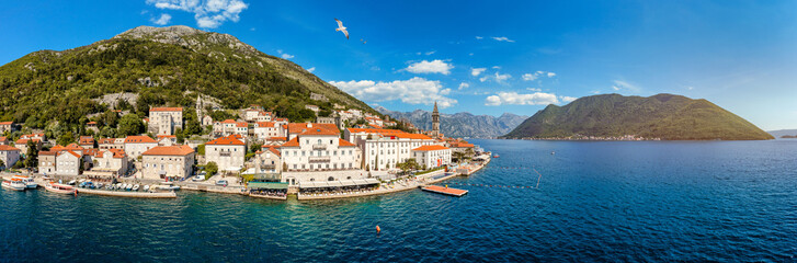 View of the historic town of Perast at famous Bay of Kotor on a beautiful sunny day with blue sky...