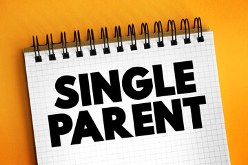 Single Parent - someone who is unmarried, widowed, or divorced and not remarried, text on notepad