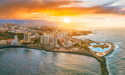 Puerto de la Cruz in Tenerife offers stunning ocean views, vibrant sunsets, and a tropical...