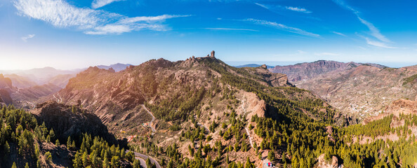 Roque Nublo and Pico de Teide in the background on Gran Canaria Island, Spain. Panoramic view of...